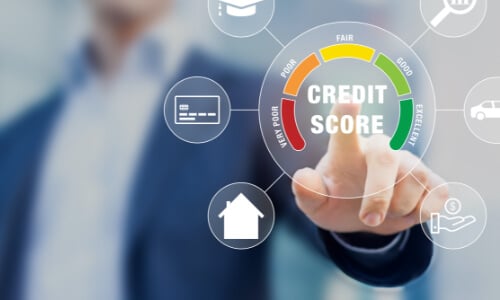Man pointing at credit score scale