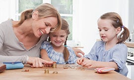 A parent and child counting money