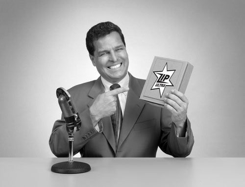 An infomercial salesman in black and white