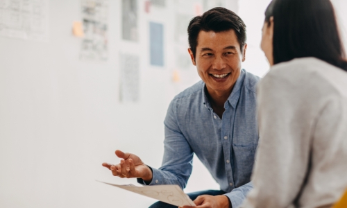 Two employees talking