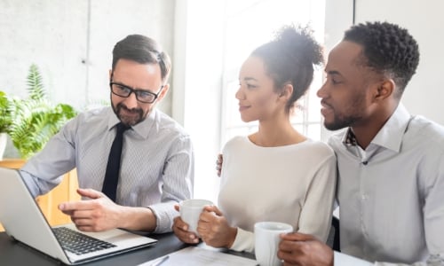 A couple meeting with a financial advisor