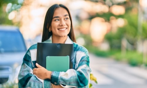 A college student walking to class