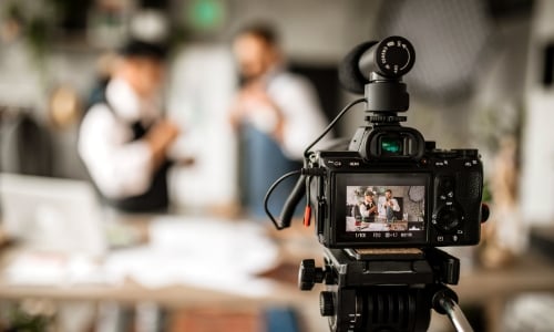 Close up of a camera taking video