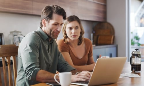 A couple discussing tax questions