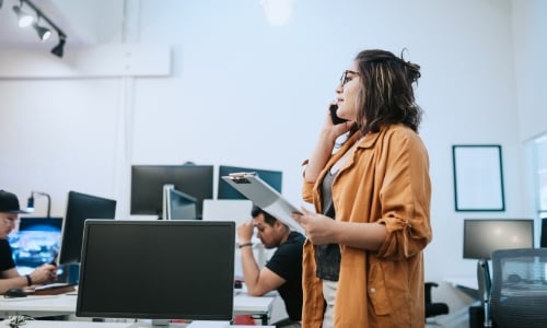 A business person making a phone call