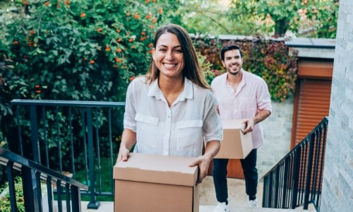 A couple moving into a new home