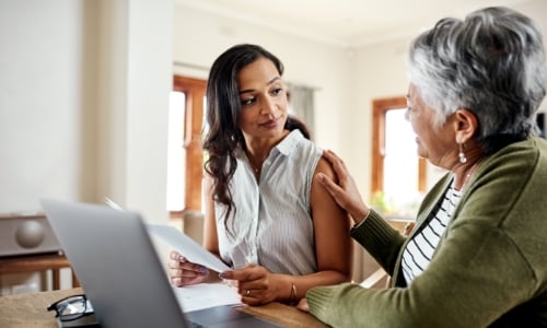 Retired parent and child discussing retirement plans