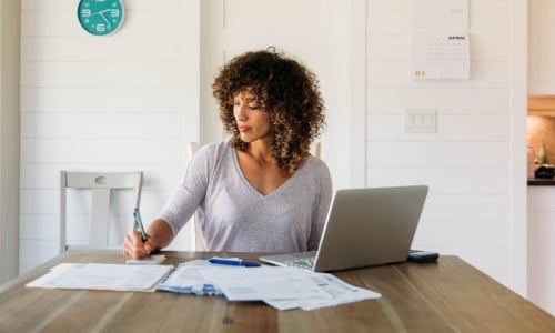 A person working on paperwork