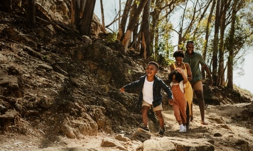 A family hiking on a hill side