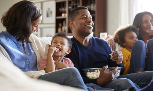 A family watching tv together