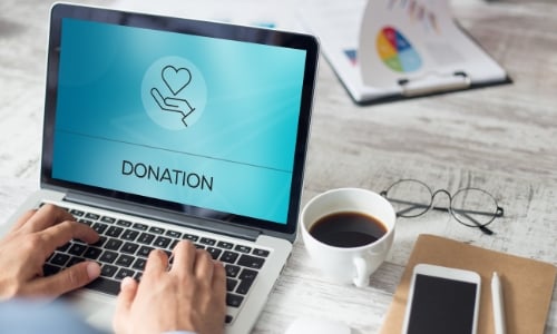 Laptop with the word donation on the screen