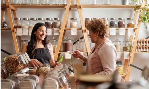 A business owner helping a customer