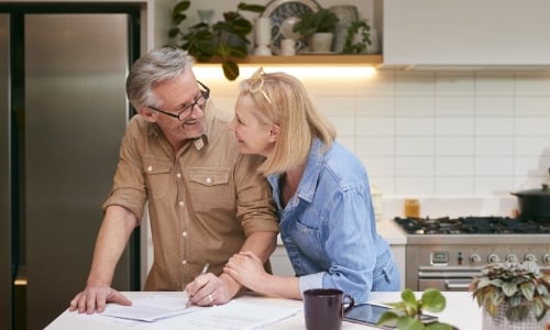 A couple working on paperwork