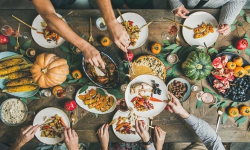 People sitting around a table eating