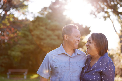 Middle-aged couple embracing each other