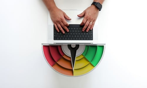 Man using a laptop and credit card concept on table