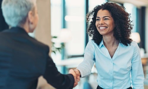 Businesswoman Tax Preparer talking to Client