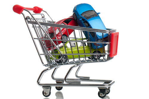 Toy cars in a shopping cart