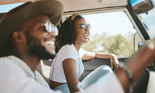 Happy couple in a car