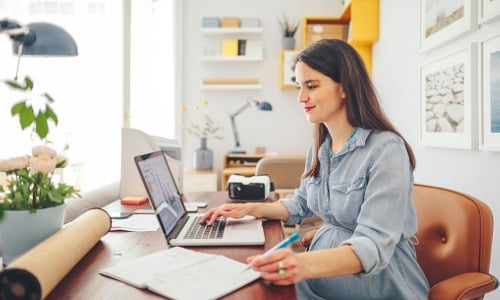 Young woman working in home office