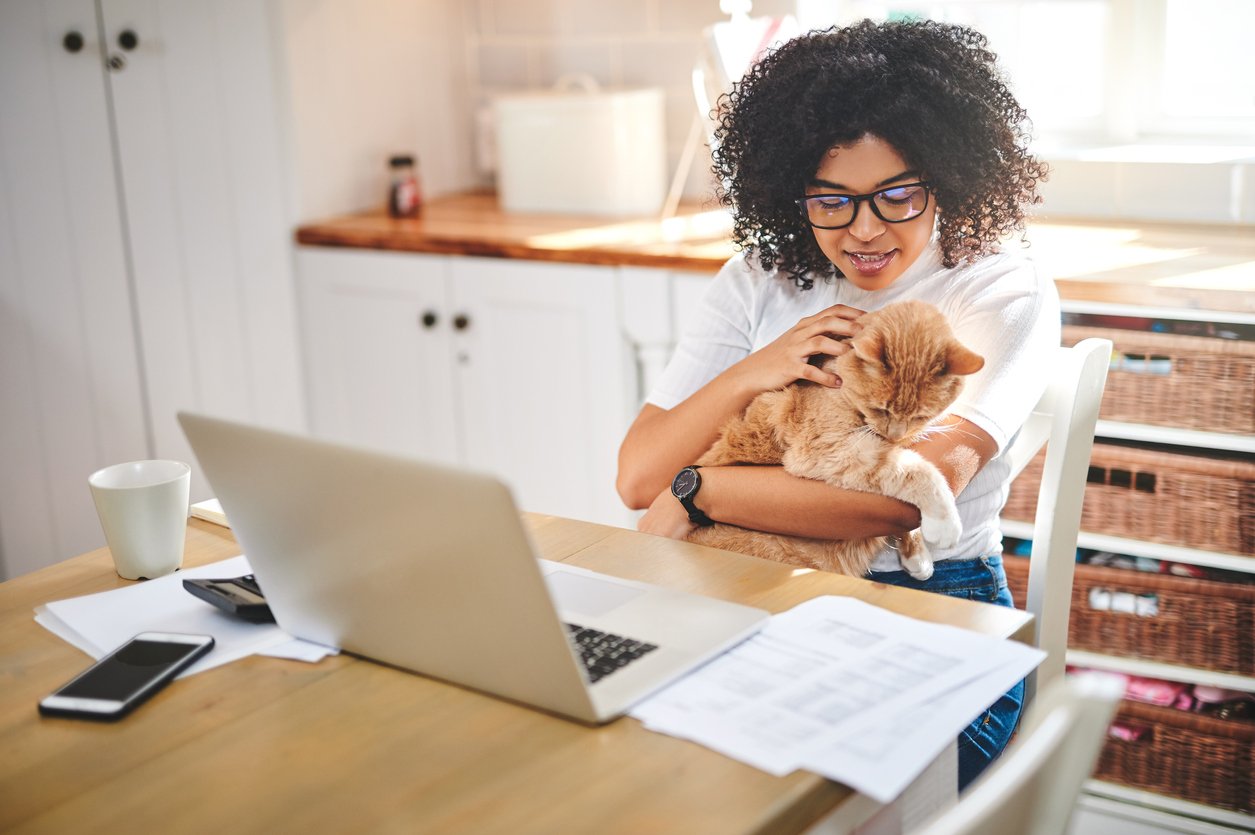 Young woman looking for pet insurance for cats