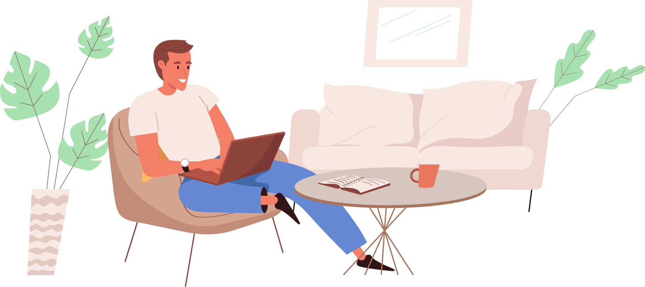 man sitting in chair working on laptop