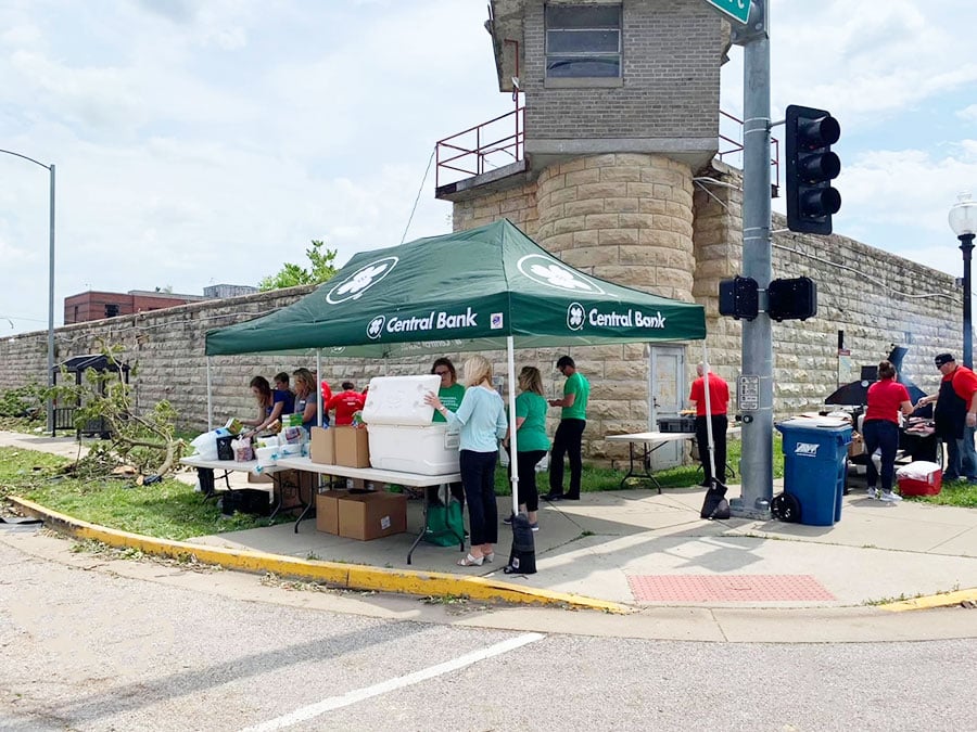 Image of Central Bank employees at a food donation pavilion