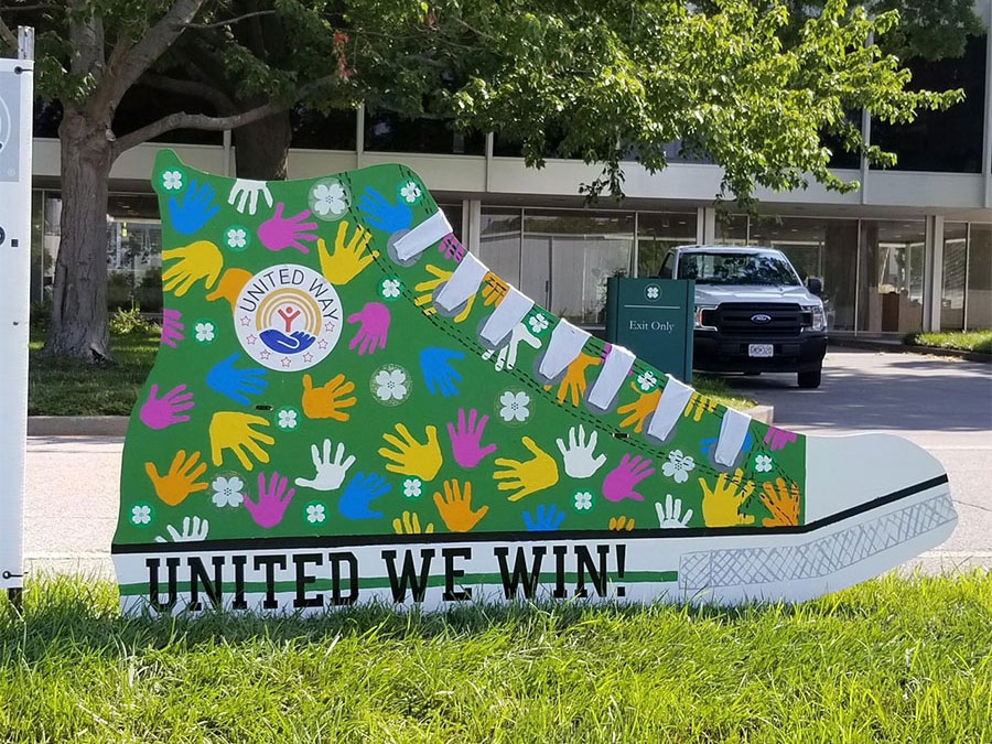 large sign for the United Way in the shape of a shoe
