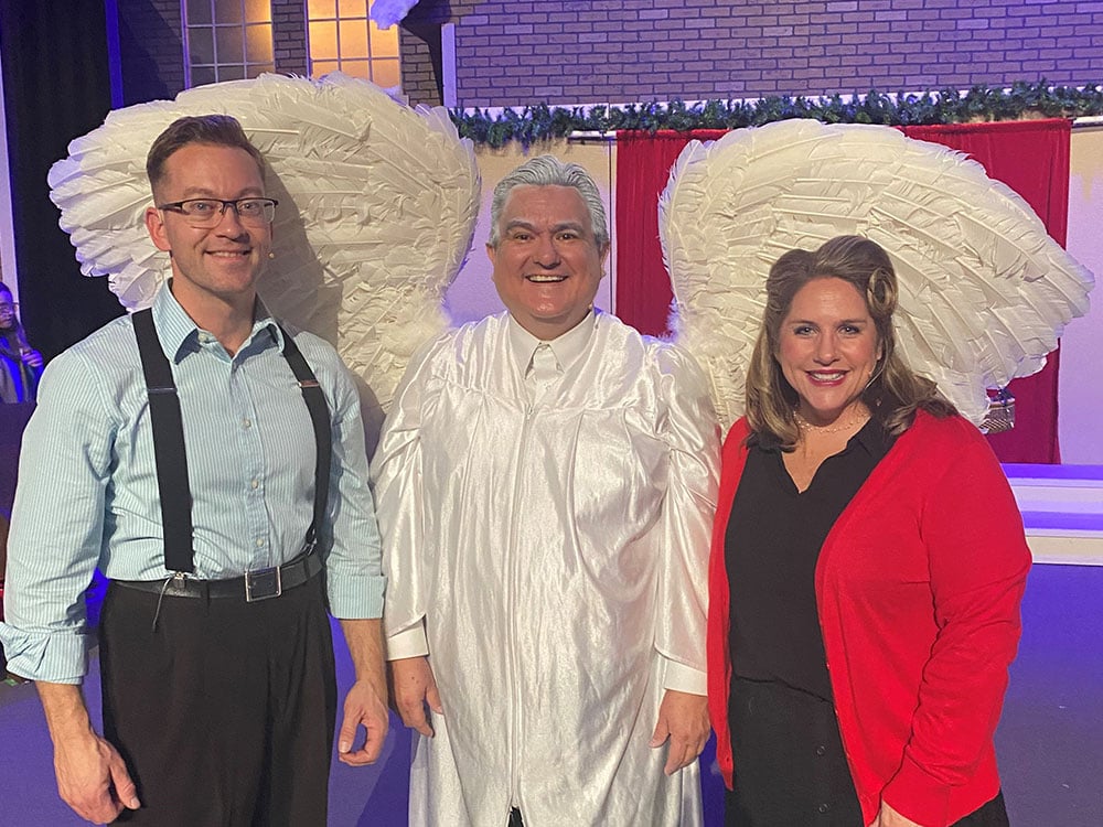 Eric dressed as an angel in a Christmas production