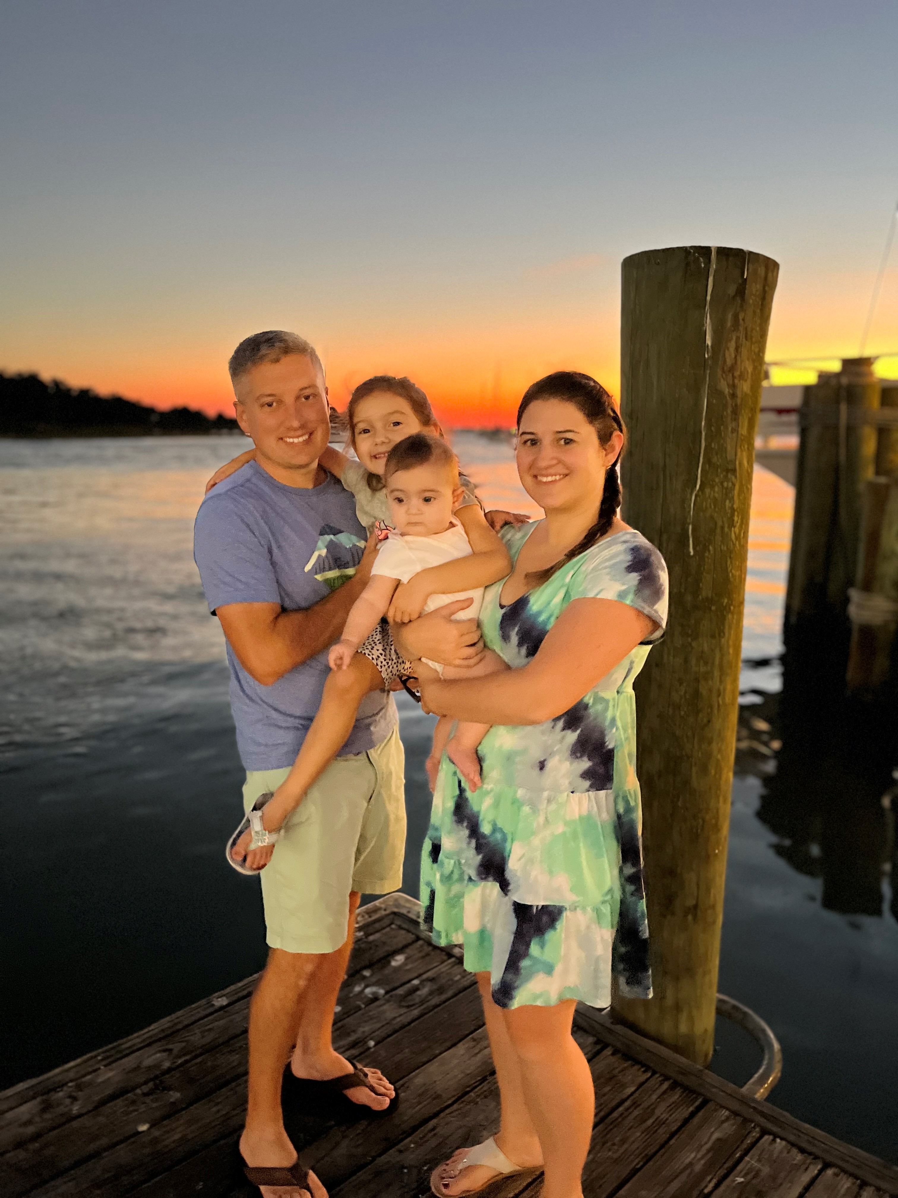 Noah on a dock with his family