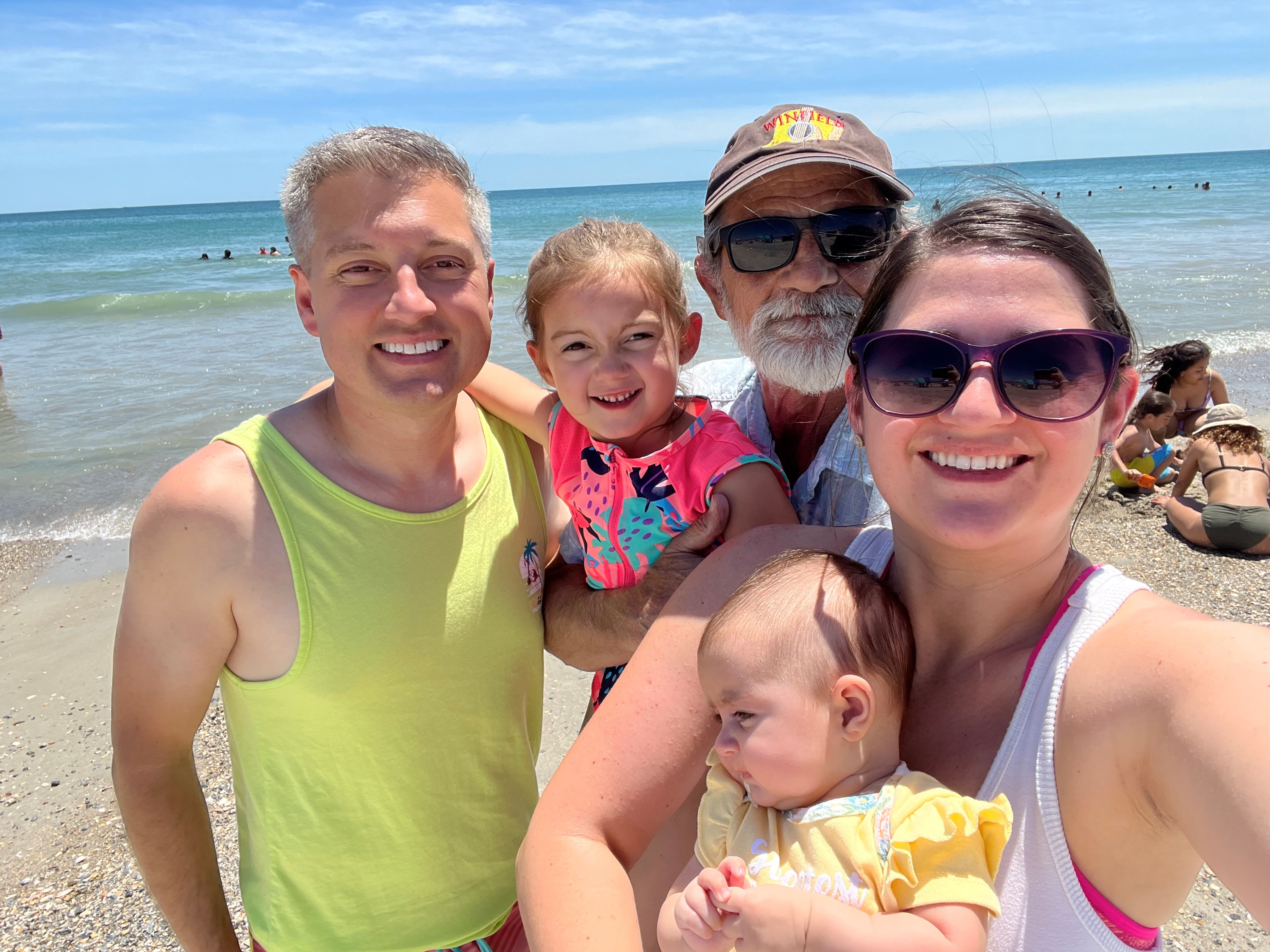 Noah with his family on the beach