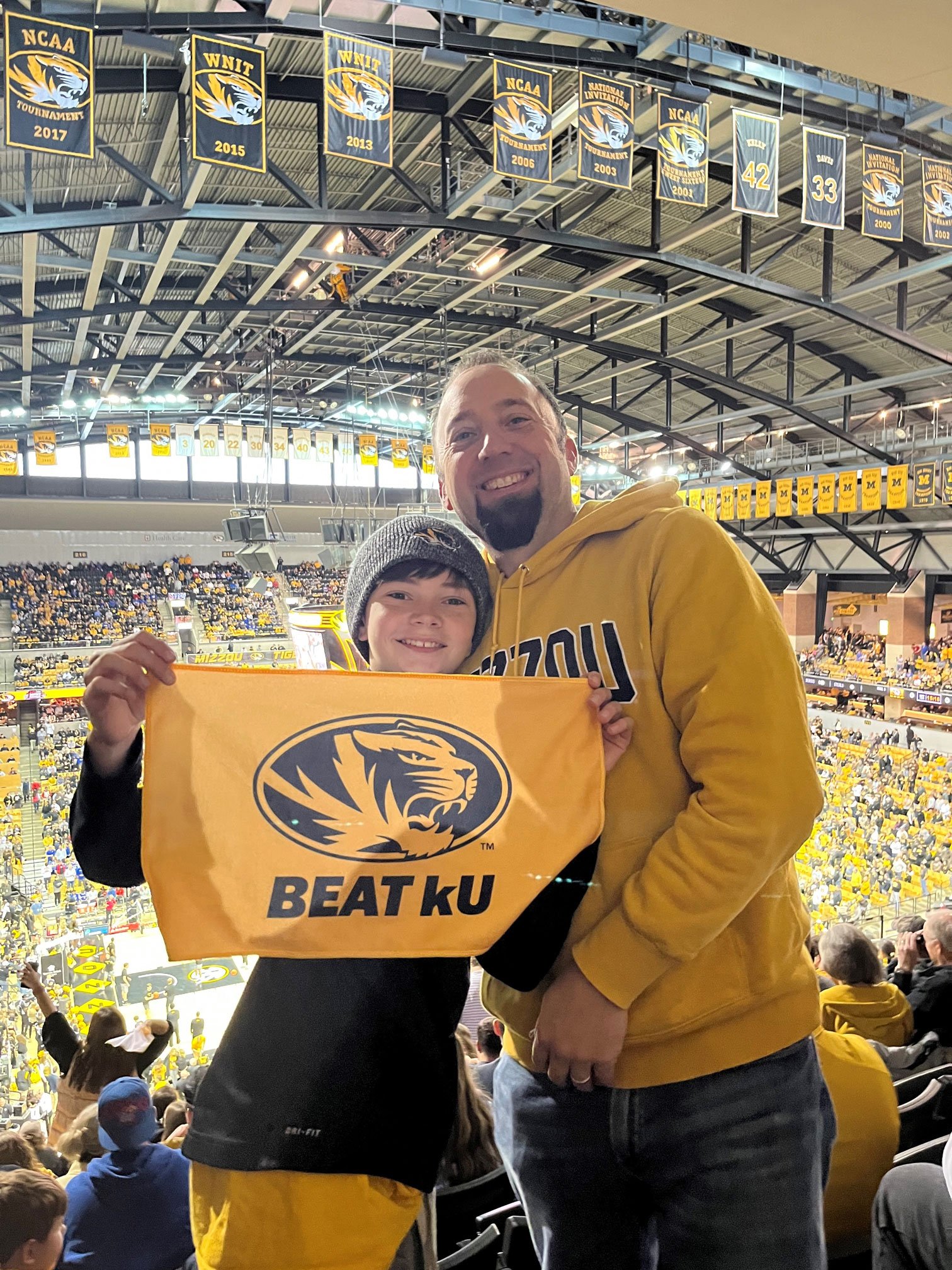CO Scheffer and his son at a MIzzou game