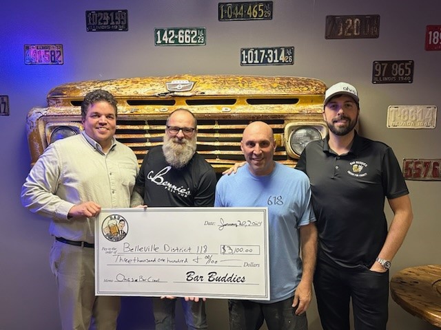 Scott holding check