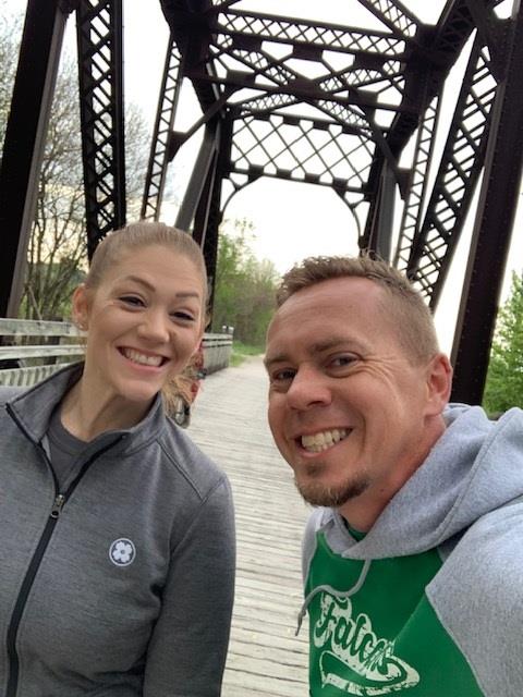 Darla on a bridge with her husband