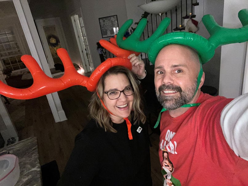 Scott and wife with balloon antlers