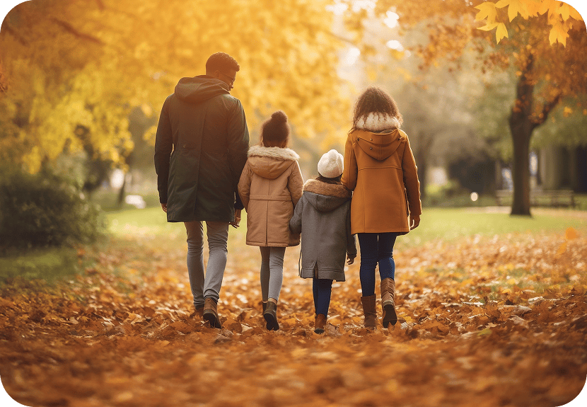 Family walking down beach