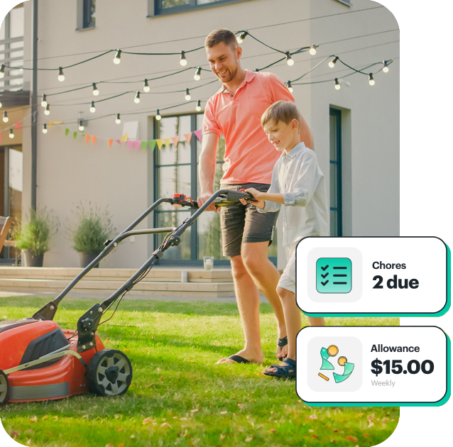 Father teaching son to mow lawn