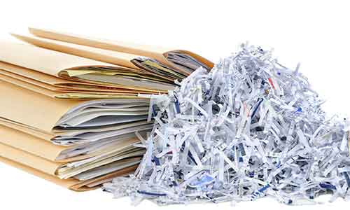 Business paperwork that needs to be shredded.