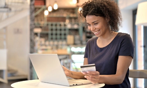 A person using credit card online