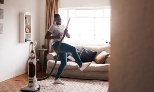 A person vacuuming