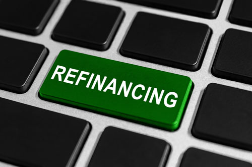 Key on a computer keyboard that says Refinancing